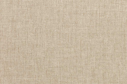 Fondo de textura de tela de lino marrón, patrón sin costuras de textil natural. photo
