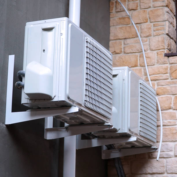 istock Air conditioners on the wall of building 1404332349