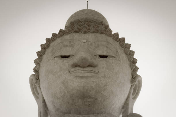 Phuket Big Buddha statue portrait in black and white. Buddhism landmark head close up in Thailand