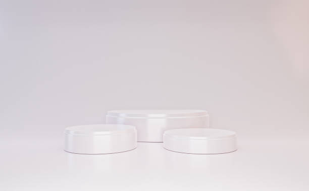 istock Three level white round podium on white background. Winner stage.Empty pedestal mockup. 3d render image 1404342633