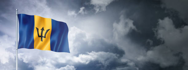 istock Barbados flag on a cloudy sky 1404348087