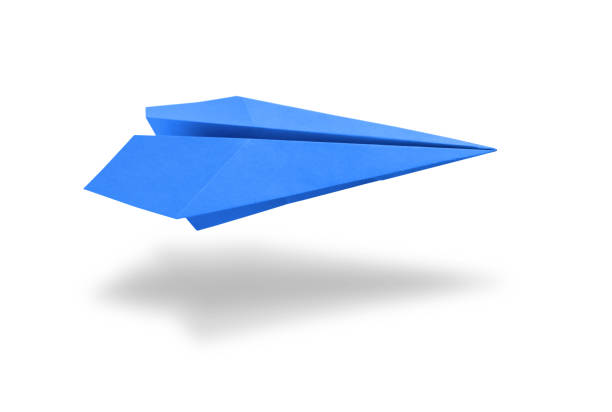 istock Blue paper plane origami isolated on a white background 1404348104