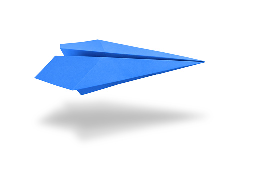 Blue paper plane origami isolated on a blank white background