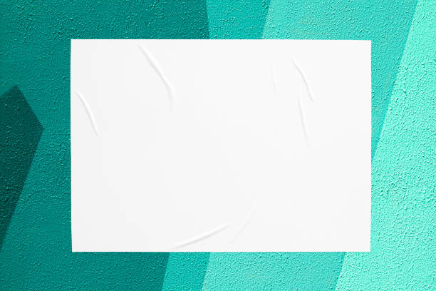 istock teal mint urban wall with glued poster 1404349540