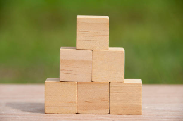istock Blank wooden blocks with blurred nature background. 1404352274