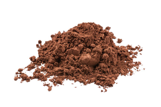 istock Heap of cocoa powder isolated on white background. 1404355294