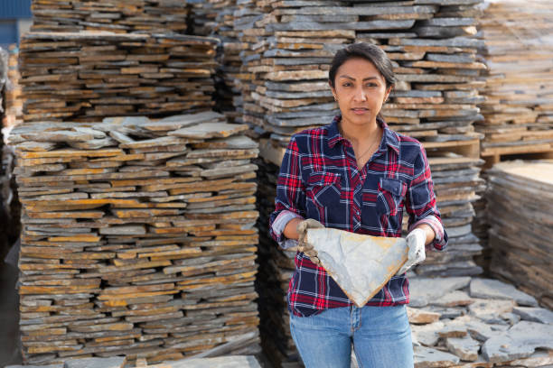 istock Buyer chooses natural facing stone at an open-air site 1404355870