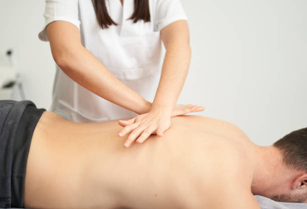 istock physiotherapist treating a contracture in the patient's back 1404356628