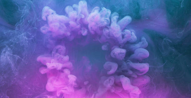 istock paint water blend magic spell neon color vapor 1404359174