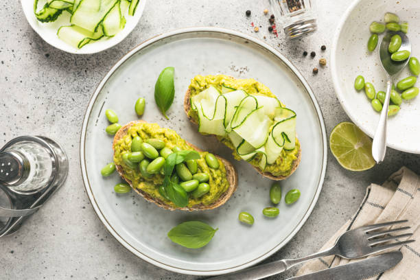 istock Healthy avocado toasts with different toppings 1404363069