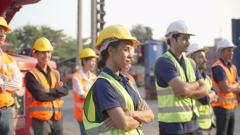 Group Of Multiracial Worker On Logistic Site On Morning Meeting