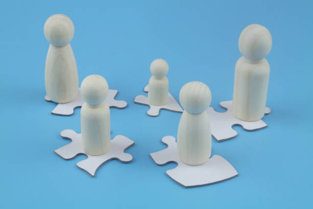 istock Family people figures on puzzles on background. 1404366725