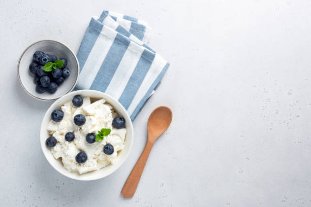 istock Cottage cheese with blueberries in bowl 1404366736