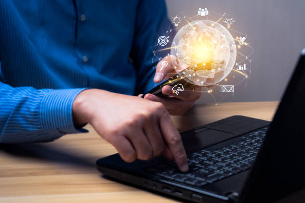 istock Businessman using smart phone. Global business internet connection application technology and digital marketing. Digital Link Technology Big Data. IoT Internet of Things 1404367559