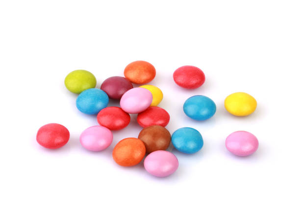 istock Colorful candies isolated on white background 1404370396