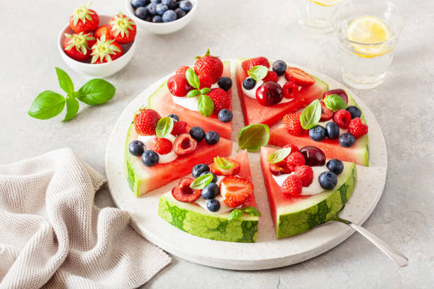 istock watermelon pizza slices with yogurt and berries, summer dessert 1404370582