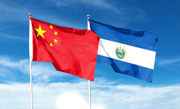 istock Twin Flags China and El Salvador Waving Flags with Textured Background 1404371073