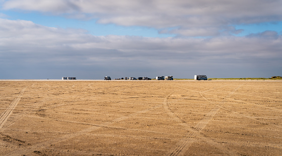 Caravans parking in a desert like area on Rømø