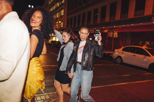 istock Young people having fun in the city at night 1404371626