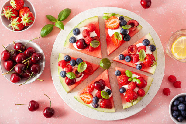 istock watermelon pizza slices with yogurt and berries, summer dessert 1404372422