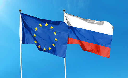 Dual Flags EU and Russia Waving Flags with Textured Background