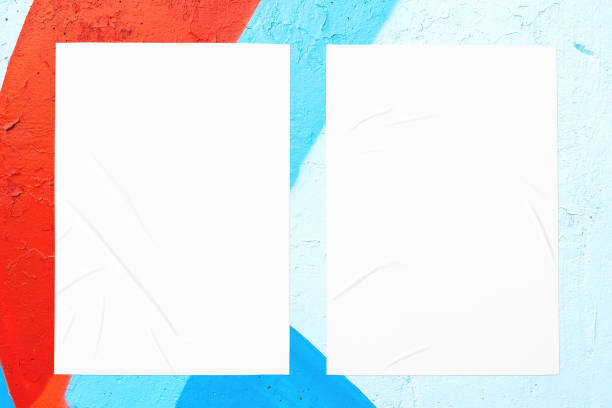 istock colorful urban wall texture with two wrinkled glued poster templates 1404376433