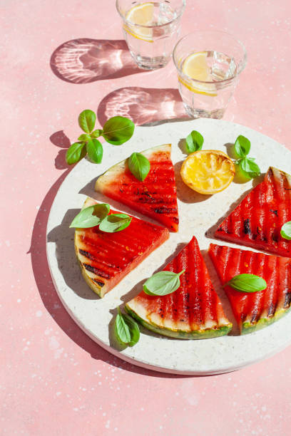 istock grilled watermelon slices with lemon and basil. summer dessert 1404377234