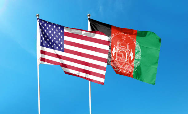 istock USA and Afghanistan twin flags waving flags on textured background 1404377316