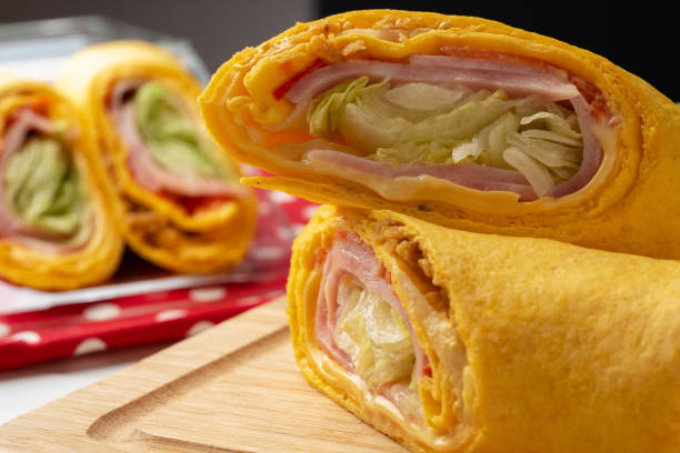 istock Fresh tortilla wraps with chicken and fresh vegetables 1404377390