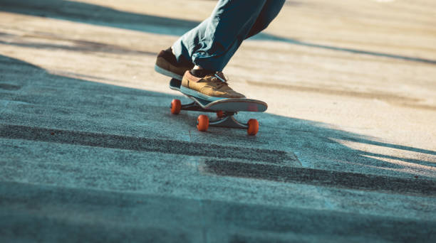istock Skateboarder skateboarding outdoors in city 1404378060