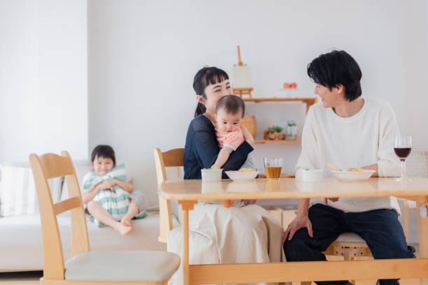 istock Families around the table with their children 1404378151