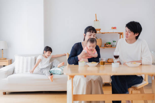istock Families around the table with their children 1404378183