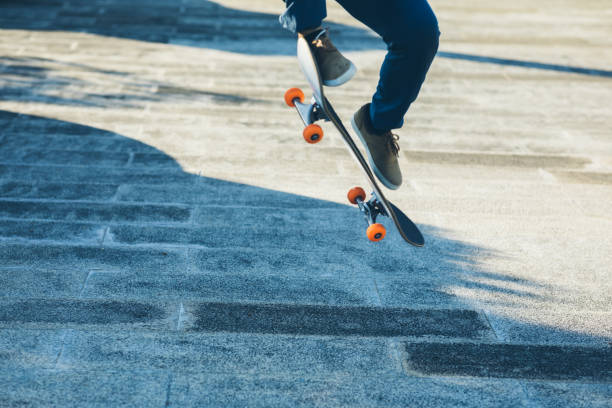 istock Skateboarder skateboarding outdoors in city 1404378299