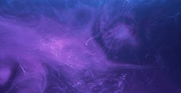 istock smoke flow magic poison blue pink paint mix 1404378355