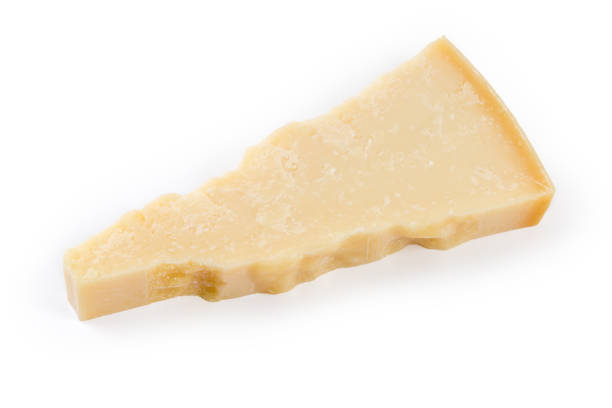 istock Piece of the hard cheese on a white background 1404378550