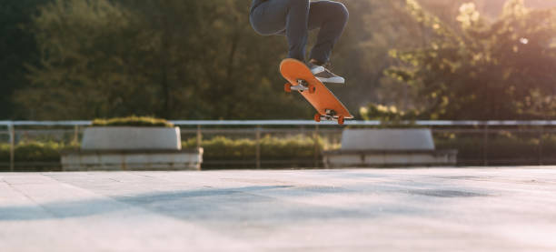 istock Skateboarder skateboarding outdoors in city 1404379846