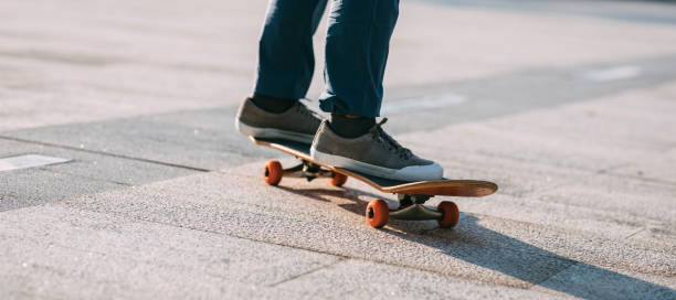 istock Skateboarder skateboarding outdoors in city 1404379876