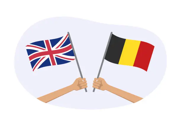 Vector illustration of UK and Belgium flags. Belgian and British national symbols. Hand holding waving flag. Vector illustration.