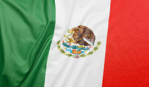 istock Mexico flag blowing in the wind. Mexican flag full page 1404382625