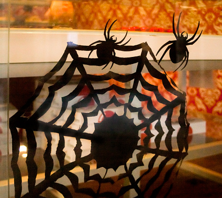 Halloween handmade decoration, spider web and two spiders shapes. Galicia, Spain.
