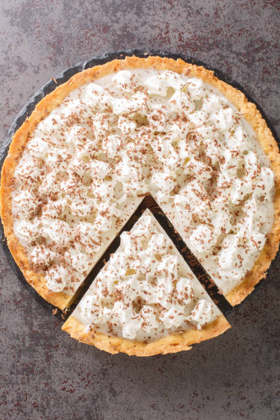 istock Coconut Hawaiian dessert Chocolate Haupia Pie on a plate. Vertical top view 1404386948