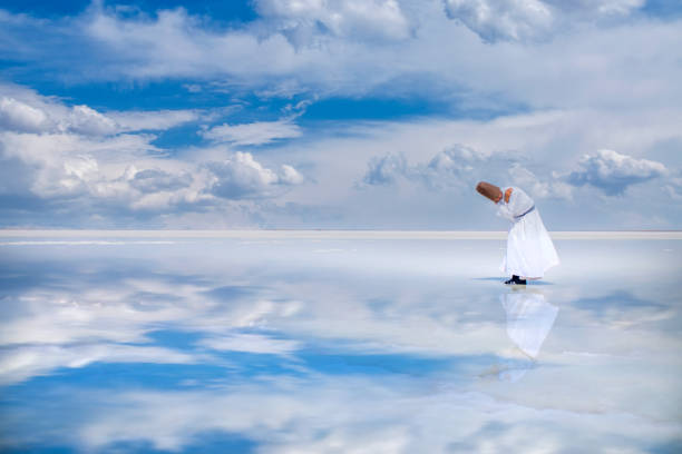 Whirling dervish whirling over the lake stock photo