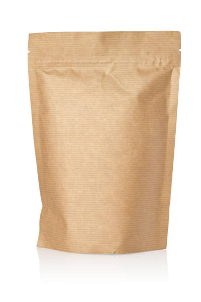 istock Brown paper pouch bag isolated on white. 1404393165