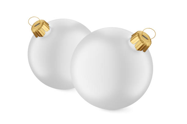 Christmas balls hanging on abstract gold, silver background.