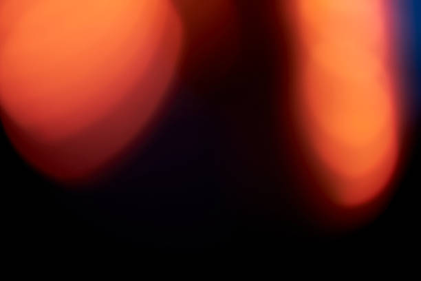 istock Abstract defocused lens light leak on black background 1404394310