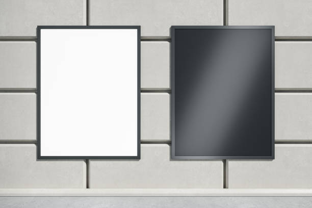 istock Abstract concrete tile wall with empty black and white billboards and daylight. Ad, commercial and information concept. Mock up, 3D Rendering. 1404396971