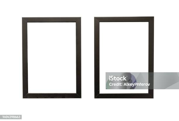 Two Natural Photo Frames With Blank Space Hanging On A Wall Isolated On White Stock Photo - Download Image Now