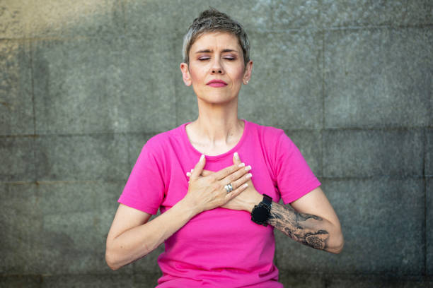 istock Beautiful mature woman meditating 1404398841