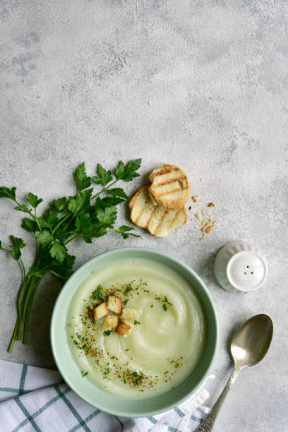 istock Vegetarian cauliflower cream soup with croutons. Top view with copy space. 1404409116