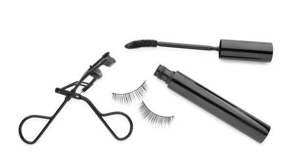 istock False eyelashes, curler and mascara on white background, top view 1404415330